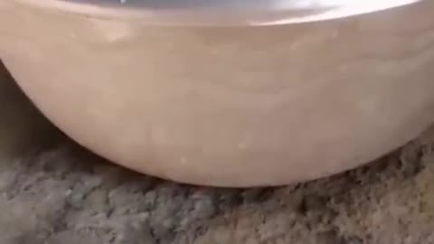 A simple free energy demonstration of how a vortex shaped surface can propel itself on moving water