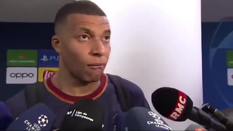 Kylian Mbappé walks away when asked by a journalist if he will support Real Madrid tomorrow.