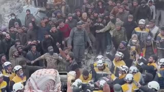 Crowd erupts in cheers as an entire family emerges from the Syria Earthquake rubble