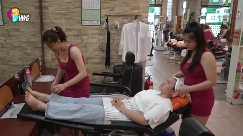 NEW!! Two girls give a full body massage in a barbershop to a beautiful female customer