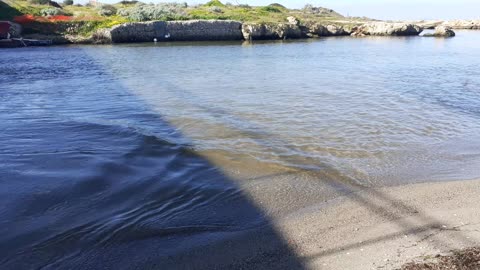 Amazing sound River flowing into the sea - Estuary of the beach