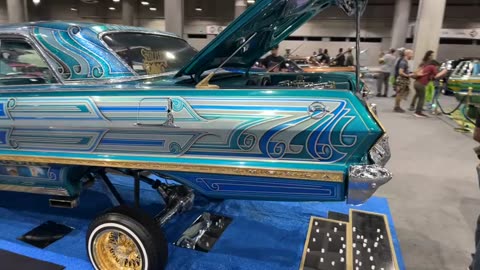 "Stunning Blue 1964 Chevrolet Impala Lowrider: Masterpiece on Wheels"