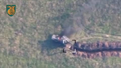 Drone Strikes on a Russian Excavator Crew Digging Trenches