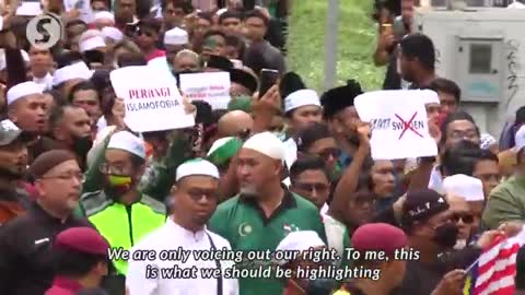 Hundreds march in protest of burning of Quran