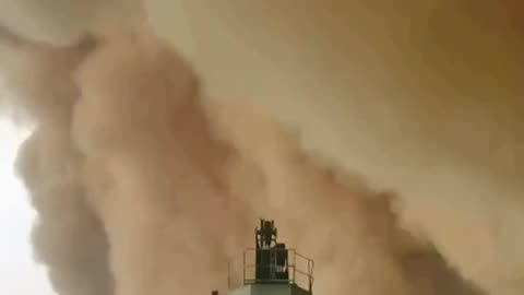 Cargo ship gets hit by a huge sandstorm in the Suez Canal