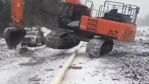How do you go over a pipe with the excavator without breaking it