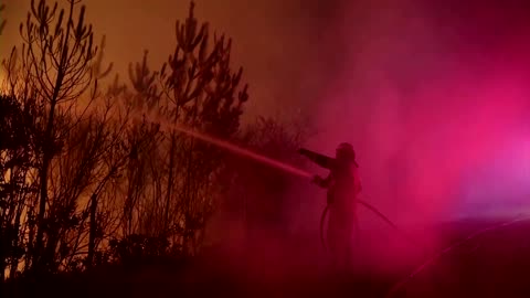 Eerie scene as Chile firefighters battle forest blaze