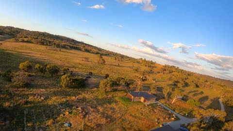 FPV quadcopter drone flight on sunset at Jindabyne NSW Australia