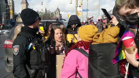 National Arts Centre in Ottawa: Protestor tells a "family friendly" drag queen storytime supporter that she "will die to protect our children"