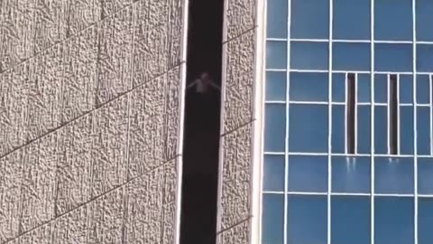 A man climbing a Chase Tower in downtown Phoenix, Arizona