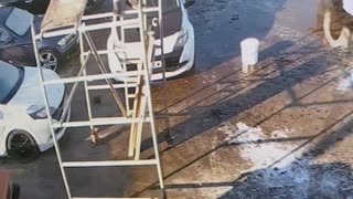 Man Falls From Scaffolding and Smashes Into Car Windshield