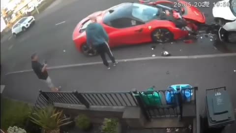 Funny people, crazy Ferrari crash as the car looks to be totaled after impact
