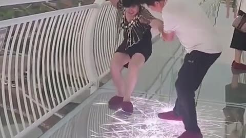 Laugh Out Loud: Tourists' Hilarious Reactions on China's Daring Glass Bridge"