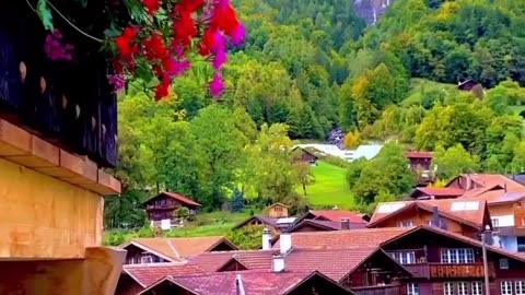 "The Emerald Village: A Swiss Paradise Amidst the Hills."
