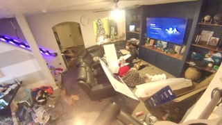 Dad Slips on Kids' Toy While Setting Up TV