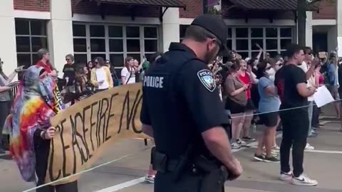 Far-left and conservative protesters unite in chant "F*ck Joe Biden" at U of Alabama