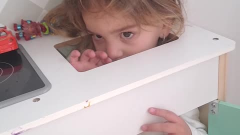 Girl Gets Stuck in Play Kitchen Sink