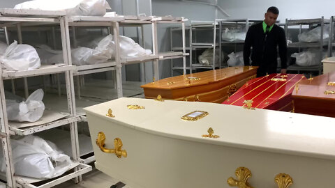 Watch: Bodies pile up as backlog of cremations escalates