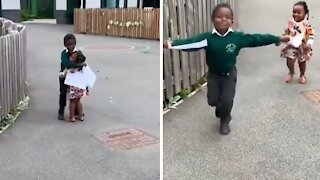 Little Girl Preciously Hugs Her Big Brother After School