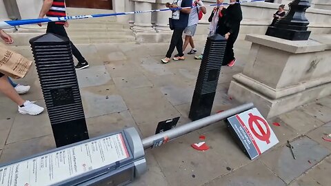 The damage to a bus stop caused a by a red bus after it crashed #horseguardsparade