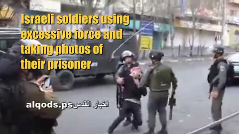 Israeli soldiers using excessive force and taking photos of their prisoner