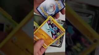 Unboxing the Pokemon 25th Anniversary tin box