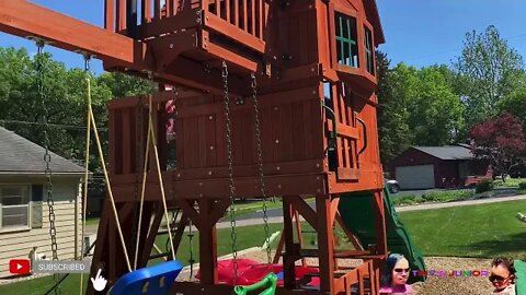 Junior washes the playhouse!