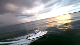 Boat races to beat storm to the safety of the harbour at sunset