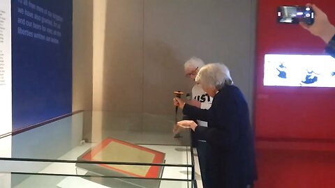 Elderly climate activists attempt to shatter the glass encasing the Magna Carta in British Library