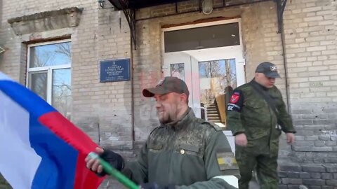 Heads of the DPR Denis Pushilin and Secretary of the General Council of United Russia Andrey Turchak raise the Red Banner and the flag of the Russian Federation over the village of Rozovka, Zaporozhye region