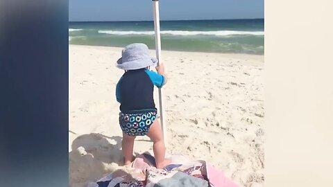 Funny video of baby playing at beach
