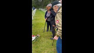 In the rain, Two WWII Veterans Honor Edward Morozewicz