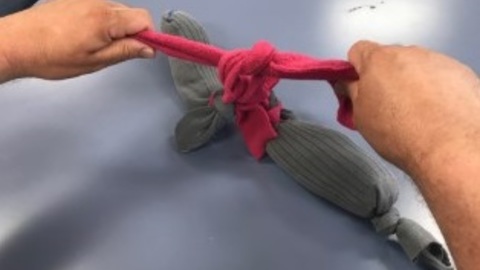 Tying or Untying Knots on Weighted Bags for Sensory Processing