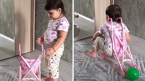Little Girl Has Comical Effort To Fit In Tiny Stroller