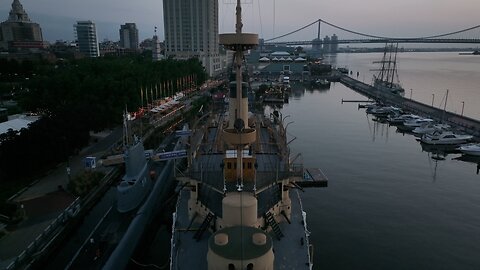 USS Olympia at dawn