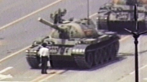 Brave Ukrainian Man Stands in Front of Russian Tank