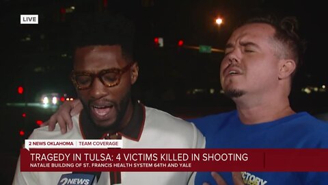 Two faith leaders praying over Tulsa