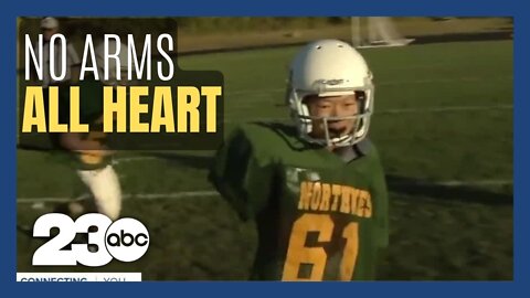 Jr. high football player without arms inspires others with his determination