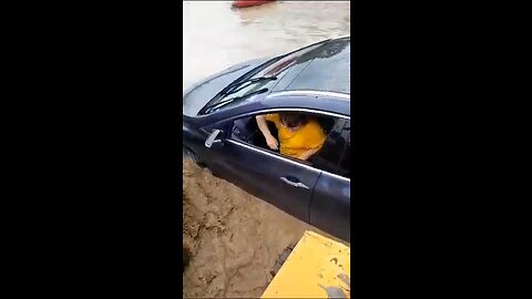 Woman saved from floods
