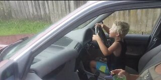 7 year old driving a BMW by himself!