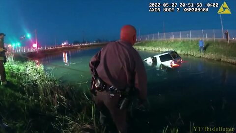 Video shows NYS Police rescuing woman from sinking SUV in retaining pond