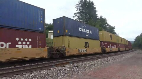 An Intermodal w/DPU slowly creeps by