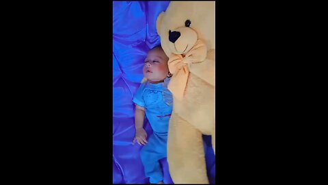 Baby sleeping with teddy bear oh my God.