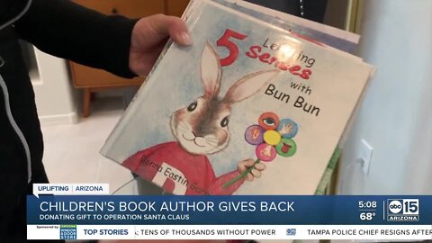 Author donates thousands of children's books to Operation Santa Claus