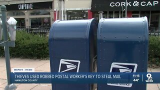 Thieves used robbed postal worker's key to steal mail, checks
