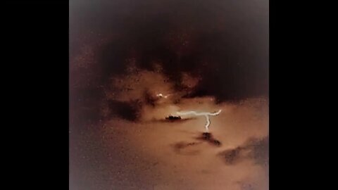 UFO ..UAP... caught on video "charging" in cloud during Lightning storm