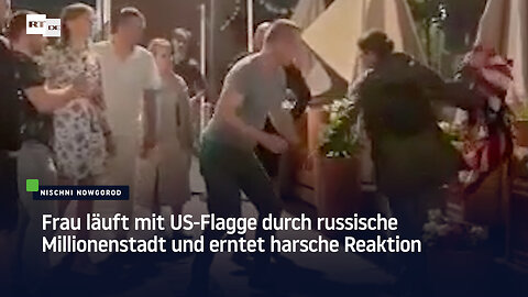 Frau läuft mit US-Flagge durch russische Millionenstadt und erntet harsche Reaktion