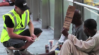 Disguised magician creates money for the homeless