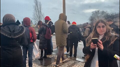 Bystanders, police vehicles near Czech university where deadly shooting occurred