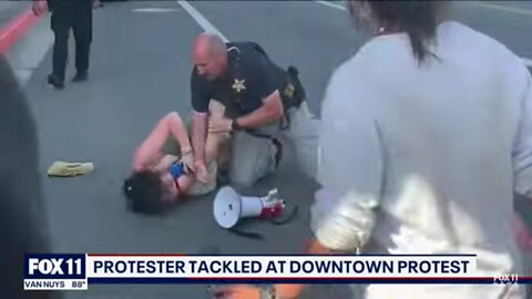 LOS ANGELES | Protester tackled outside Summit of the Americas